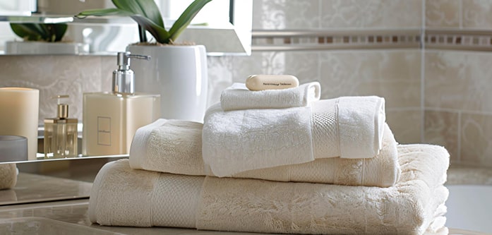 انواع حوله مناسب برای حمام انواع اندازه های حوله حمام